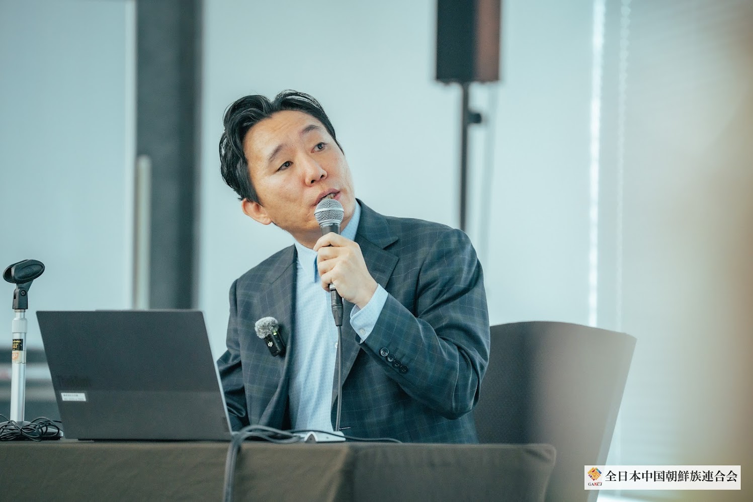 弊社代表 安 龍洙 登壇の様子